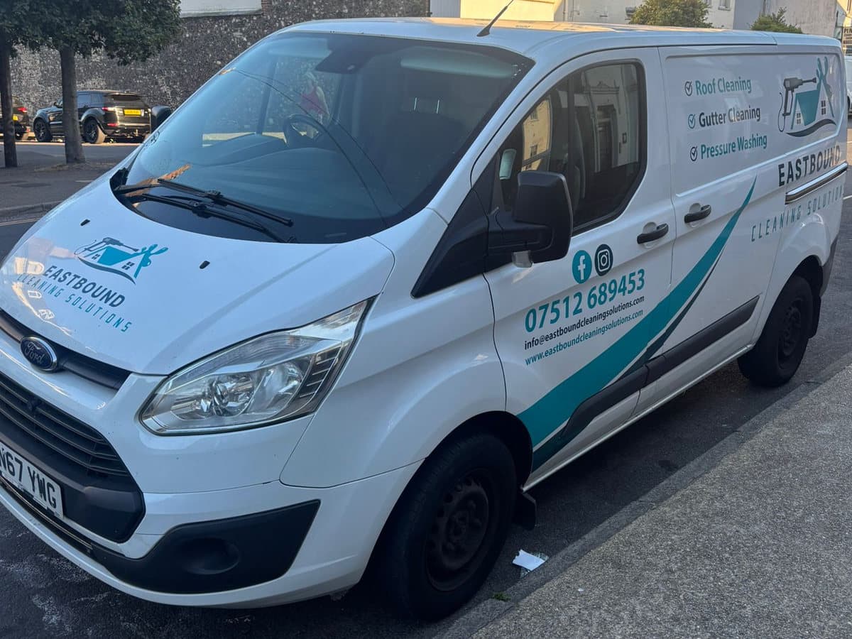 The sign-written Eastbound Cleaning Solutions Transit parked on a Great Yarmouth street